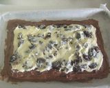 A picture of step 5 of Raisin Cream Cheese Chocolate Squares.