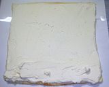 A picture of step 12 of White Roll Cake with White Chocolate.