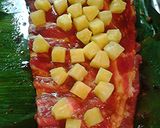 A picture of step 4 of Pineapple pork ribs cooked in banana leaves.