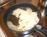 A picture of step 2 of Sautéed Hanpen Seasoned with Mentsuyu and Ao-nori Seaweed.