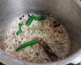 A picture of step 2 of Aloo Matar Pulav.