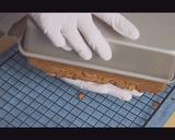 A picture of step 12 of Chocolate Chip Coffee Pound Cake.