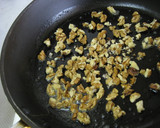 A picture of step 3 of Stir Fried Cabbage and Walnuts with Lemon Butter.