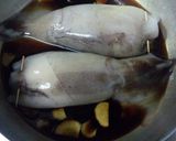 A picture of step 7 of Self-braising Scrumptious Rice Stuffed Squid.