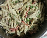 A picture of step 8 of Chicken Penne Alfredo with veggies and homemade sauce.