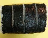 A picture of step 14 of Decorated Sushi Rolls: Snowmen Nori Rolls.