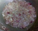 A picture of step 2 of Karahi style alu matr chicken ka salen.
