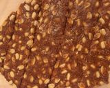 A picture of step 6 of Peanut and coconut bar/chikki.