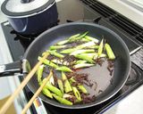 A picture of step 4 of Asparagus, Pork & Goji Berry Stir-Fry.