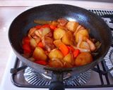 A picture of step 6 of Nikujaga (Simmered meat and potatoes) with Thick Cut Pork Belly.