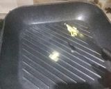 A picture of step 4 of Tawa grill crunchy bun.