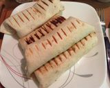 A picture of step 11 of Ham Egg And Cheese Burritos.
