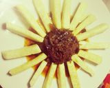 A picture of step 4 of Yam fries with onion sauce.