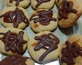 Foto del paso 8 de la receta: Pepas con dulce de leche y baño de chocolate