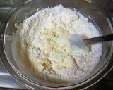 A picture of step 7 of Caramel Crumble Muffins.
