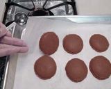 A picture of step 29 of Rich Bitter Chocolate Macarons.