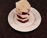 A picture of step 12 of Peanut Butter and Jelly Whipped Cream Mini Layer Cakes.