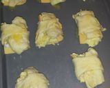A picture of step 6 of Buttery croissant filled with green onion egg and cheese mixture.