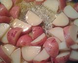 A picture of step 1 of Cheesy pan potatoes.