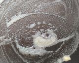 A picture of step 4 of Apple stuffed french toast.