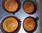 A picture of step 6 of Orange flavour cup cakes.