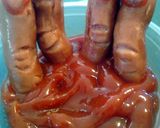 A picture of step 7 of Bloody Severed Fingers ( hot dogs with ketchup ) halloween.