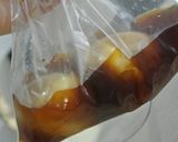 A picture of step 7 of Oh-So-Creamy Marinated Eggs.