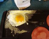 A picture of step 5 of taisen's fried breakfast sandwich.