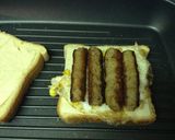 A picture of step 7 of Grilled Sausage Fried Egg And Cheese.