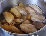 A picture of step 6 of Pressure Cooked Tender Chicken Wings and Daikon.