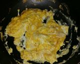 A picture of step 11 of Shrimp, Egg and Pea fried rice.