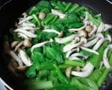 A picture of step 1 of Perfectly Nutritious Komatsuna and Shimeji Mushroom Namul.