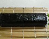 A picture of step 13 of Salad Roll (with rolling instructions).