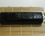 A picture of step 13 of Salad Roll (with rolling instructions).