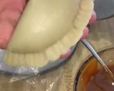A picture of step 4 of Empanadas with Cola.