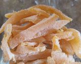 A picture of step 13 of Orange candies in two varieties.