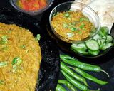 A picture of step 13 of Tawa daal.