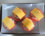 A picture of step 6 of Baked Tomatoes with Beans & Cheese.