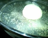 A picture of step 2 of Garlicky parsley red potatoes.