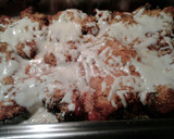 A picture of step 4 of chicken fingers parmesan.