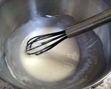 A picture of step 9 of Lemon Poppy Zucchini Muffins with Lemon Glaze.