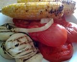 A picture of step 1 of Grilled corn, onion and bean salsa.