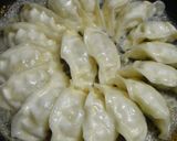 A picture of step 5 of Crispy Winged Gyoza with Grated Cheese.