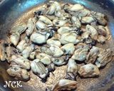 A picture of step 4 of Oil-Marinated Oysters.