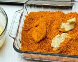 A picture of step 6 of Dorito crusted chicken fingers.