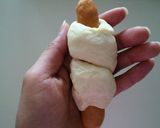 A picture of step 4 of Cheese Wiener Sausage Buns.
