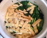 A picture of step 2 of A Ginger-Scented Side Dish Simmered Komatsuna, Atsuage, and Shirasu.