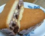 A picture of step 12 of Rum Raisin Ice Cream Cookie Sandwiches.