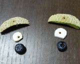 A picture of step 4 of A Hungry Frog-Shaped Melon Bowl Dessert.