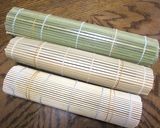 A picture of step 9 of Doll's Festival Seafood Futomaki Sushi Rolls with Nanohana.